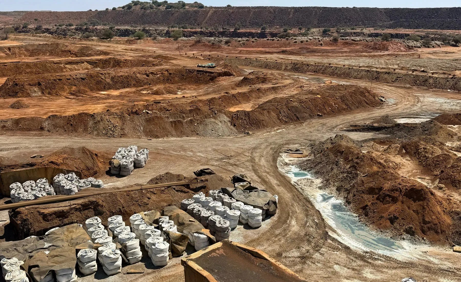 Stockpiles, bagged material and haul roads at the Selebi-Phikwe site, seen from above