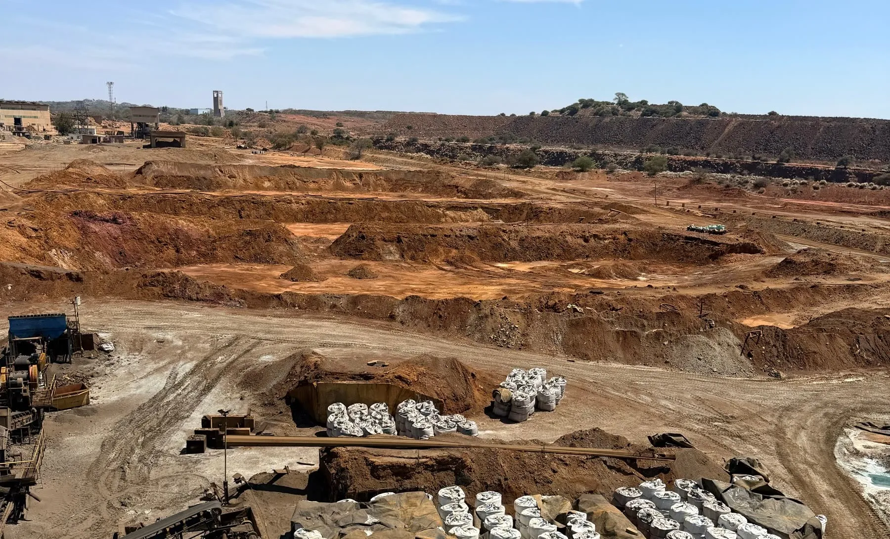Stockpiles and rows of bagged material at the Selebi-Phikwe site, seen from above